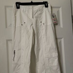 Style and Co. White slacks with zippers on calf.